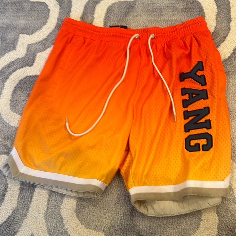 I’m selling these multi color Nike shorts